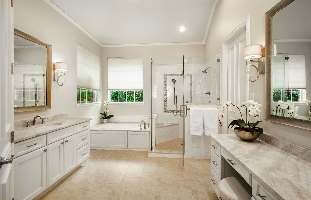 Luxury bathroom remodel with dual vanity and glass shower